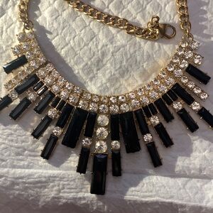Necklace cubic stone with black set in gold colored